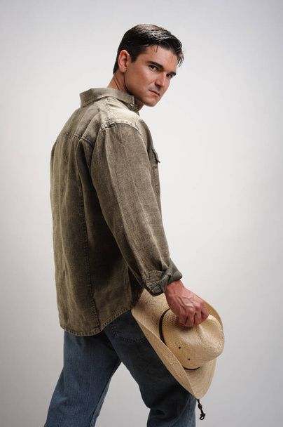 The sexy cowboy prepares to meet his lady. - Photo, Image
