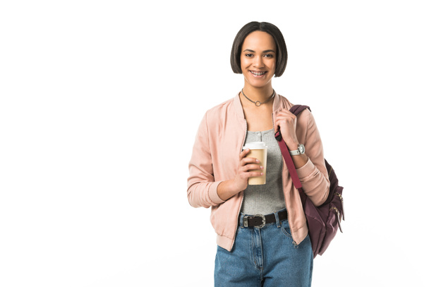beautiful african american student with backpack holding coffee to go, isolated on white - Fotoğraf, Görsel