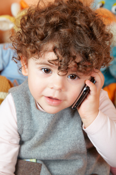 Baby girl talking on phone - Zdjęcie, obraz