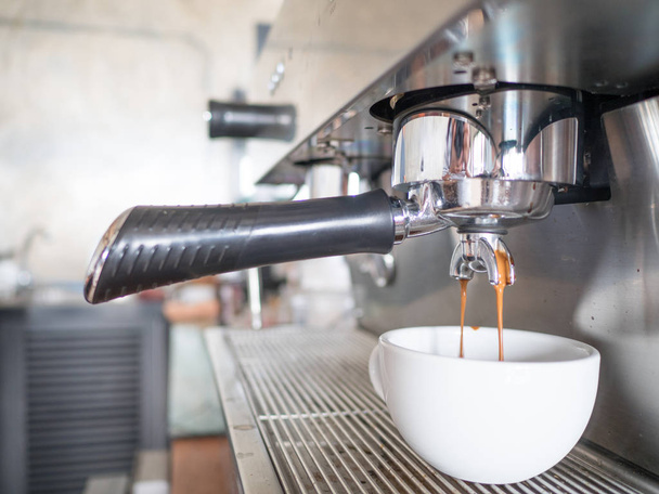 hand making coffee in a coffee shop. - Фото, изображение