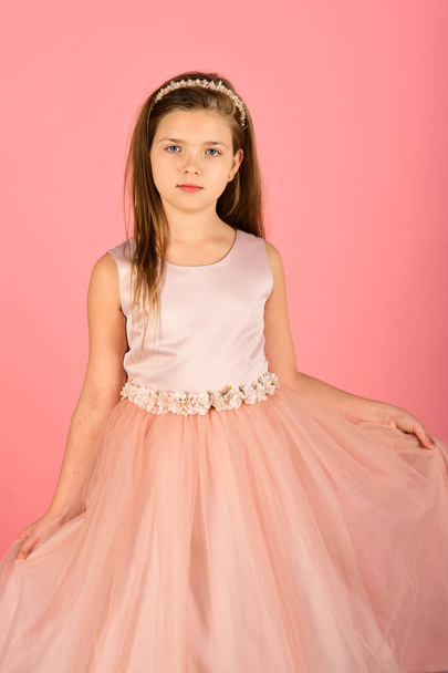 Fashion model on pink background, beauty. Look, hairdresser, makeup. Fashion and beauty, little princess. Little girl in fashionable dress, prom. Child girl in stylish glamour dress, elegance. - Φωτογραφία, εικόνα