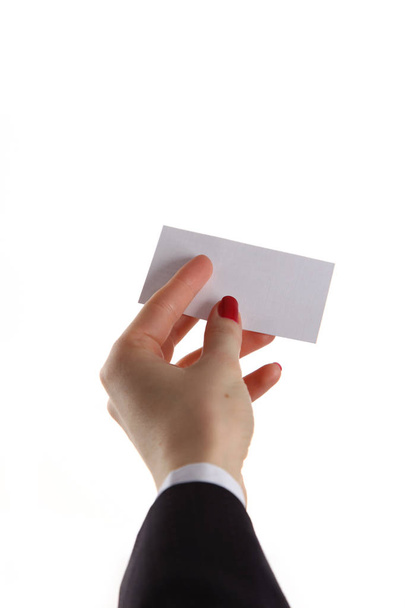Female hand holding business card in office - Фото, зображення