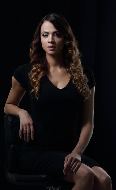 young gorgeous caucasian brunette in dress on chair - Fotó, kép