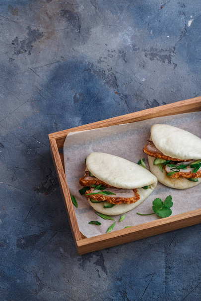Chinese steamed buns with pork belly, top view, place for wording - Photo, Image