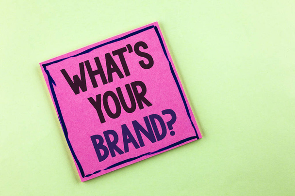 Text sign showing What is Your Brand Question. Conceptual photo asking about your company manufacturer or model written on Pink Sticky Note Paper on the plain background. - Photo, Image