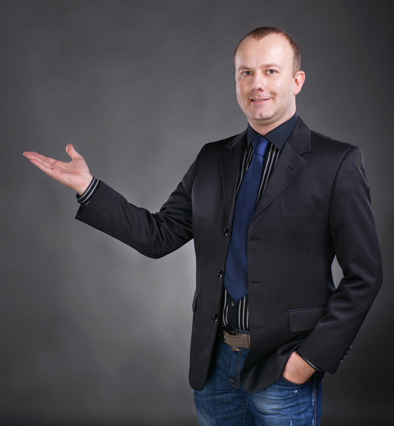 Business man in suit giving presentation - Valokuva, kuva