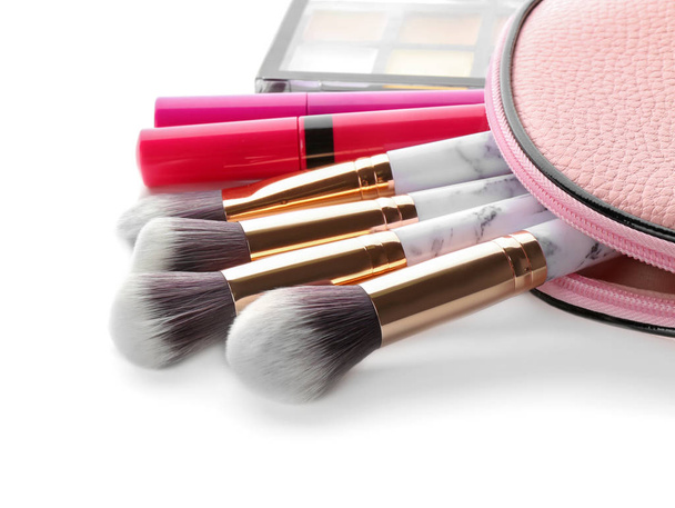 Set of cosmetic products and brushes on white background - Foto, Imagen