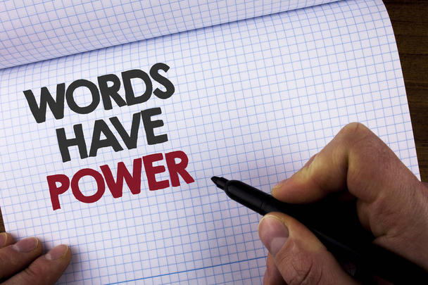 Writing note showing  Words Have Power. Business photo showcasing Statements you say have the capacity to change your reality written by Man on Notebook Book holding Marker on the wooden background - Photo, Image