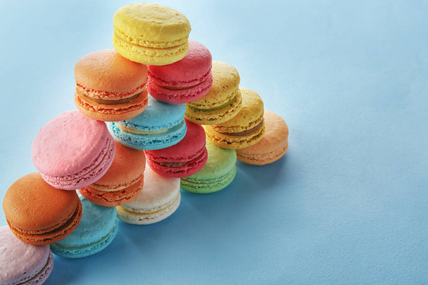 Delicious macarons on color background - Photo, Image