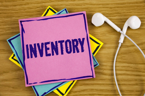 Conceptual hand writing showing Inventory. Business photo showcasing Complete list of items like products goods in stock properties written on Sticky Note Paper on wooden background Handsfree. - Photo, Image