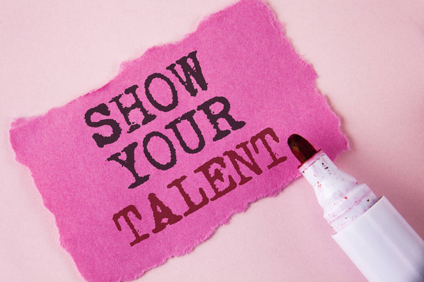 Текст для написания слов Show Your Talent. Business concept for Demonstrate personal skills knowledge aptitudes written on Tear Pink Sticky note paper on Pink background Marker next to it
. - Фото, изображение