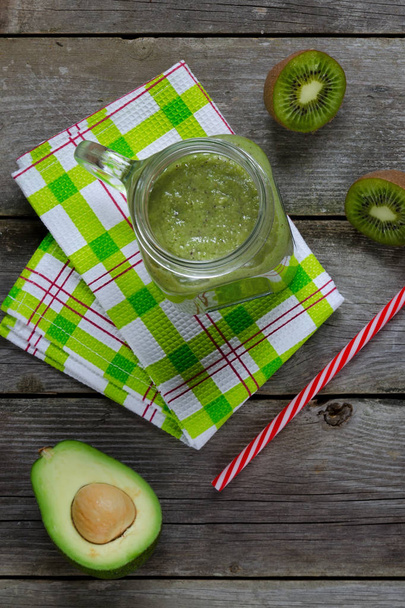 Freshly prepared smoothies of avocado, kiwi, spinach - Fotó, kép