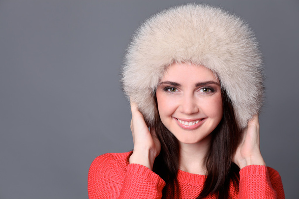 portrait of a beautiful happy woman in a knitted jacket - Fotografie, Obrázek