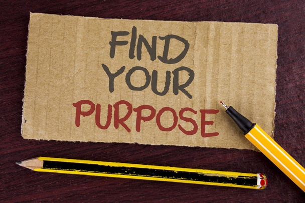 Text sign showing Find Your Purpose. Conceptual photo life goals Career Searching educate knowing possibilities written on Cardboard Piece on wooden background Led Pen and Pencil next to it. - Foto, immagini