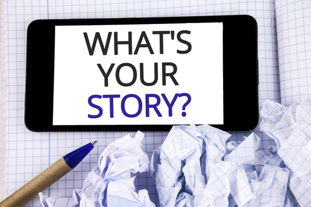 Text sign showing What Is Your Story Question. Conceptual photo Telling personal past experiences Storytelling written on Mobile Phone Screen placed on Notebook Pen next to it. - Photo, Image
