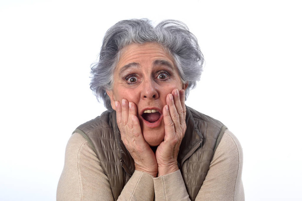 an older woman who has a surprise - Фото, зображення