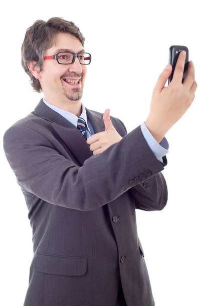 бізнесмен у костюмі та краватці, роблячи фото селфі з мобільним телефоном
 - Фото, зображення