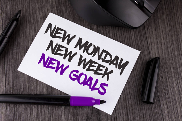 Handwriting text writing New Monday New Week New Goals. Concept meaning next week resolutions To do list Goals Targets written on White Sticky Note Paper on the wooden background Mouse Markers - Photo, Image