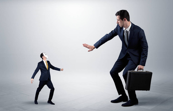 Conflict between small and big businessman - Фото, зображення