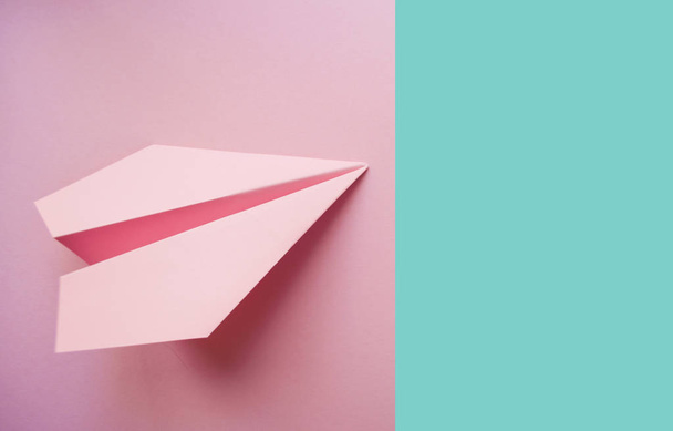 Paper plane on pink background. - Photo, Image