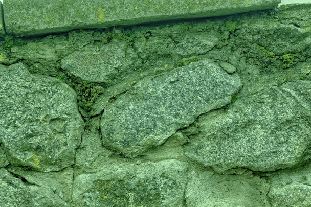 Shaded spruce cobblestone close-up texture, stone surface - Photo, Image