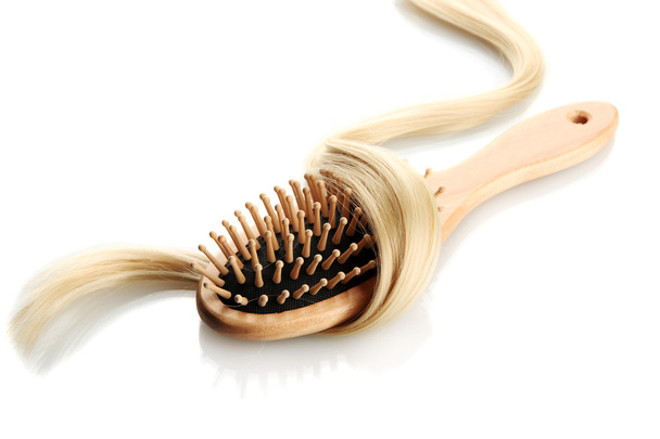 wooden comb brush with hair, isolated on white - Fotografie, Obrázek