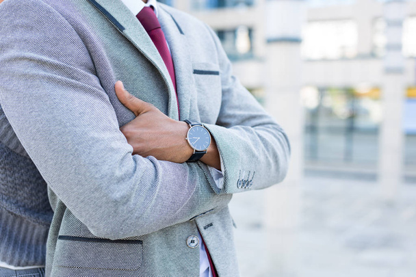 Closeup of a business mans watch and suit daytime - Valokuva, kuva