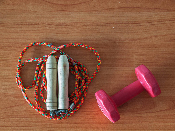 Jump rope and dumbbell , Sports Equipment. - Photo, Image