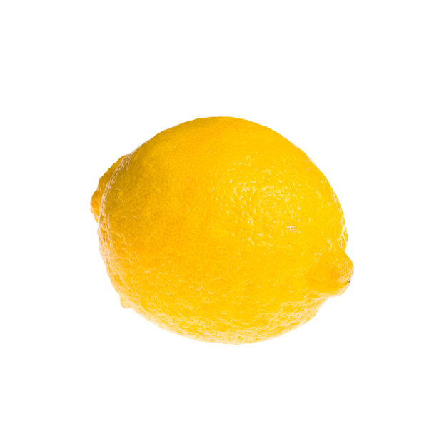 yellow ripe lemon over the white background - Фото, зображення