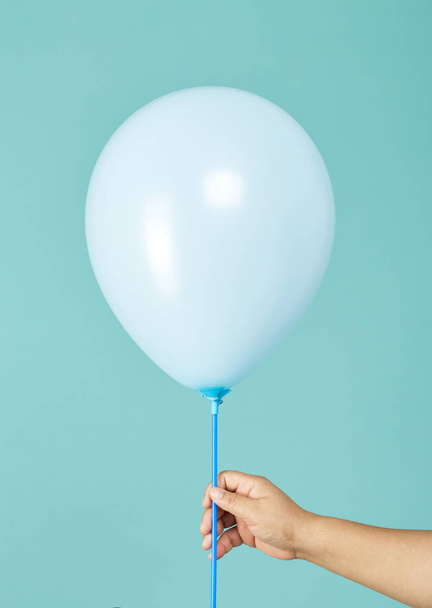Blue balloon on a blue background - Photo, Image
