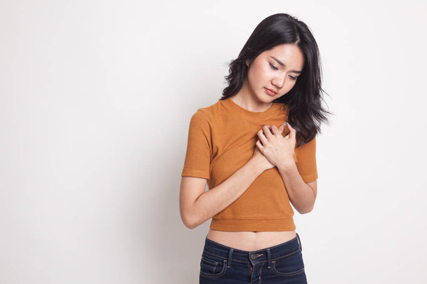 Young Asian woman got chest pain. - Foto, Bild