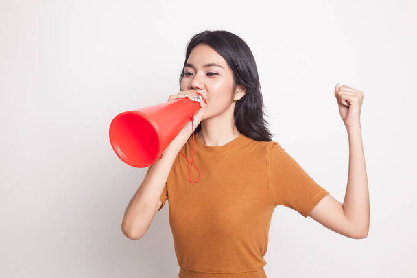 Beautiful young Asian woman announce with megaphone. - 写真・画像