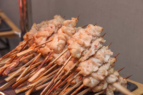 many small kebabs with salmon fish. catering food. snacks and appetizers. - Fotografie, Obrázek