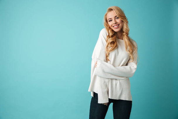 Portrait of a smiling young blonde girl - Photo, image