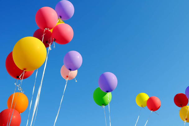  multicolored balloons  in the city festival - Foto, Imagem