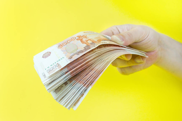 Russian money in hand - Fotó, kép