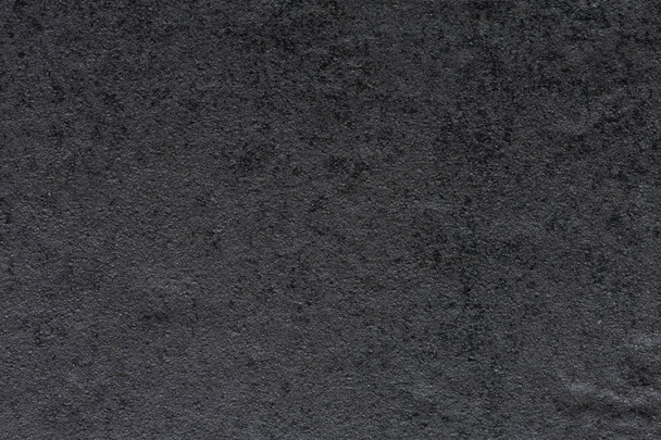 Strict synthetic stone background in dark grey tone. - Foto, Imagem