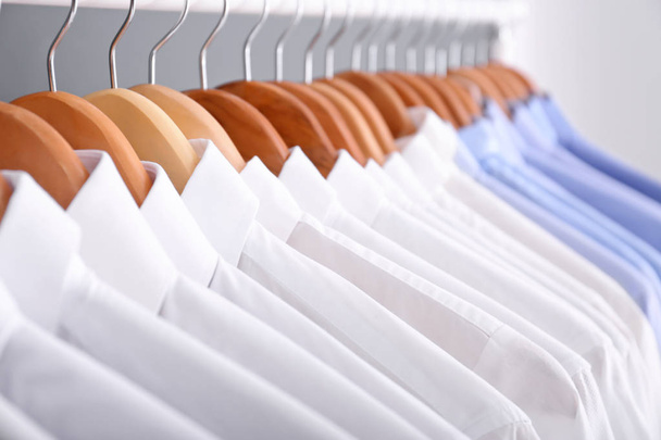 Clean clothes on hangers after dry-cleaning, closeup - Foto, Imagem