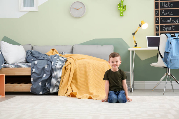Cute little boy at home. Modern child room interior - Фото, изображение