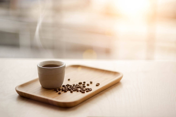 Hot coffee and coffee beans - 写真・画像