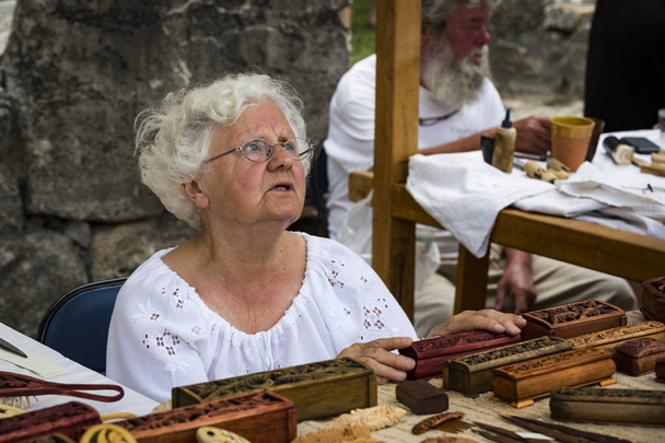 BUDAPEST, HUNGARY - AUGUST 20, 2017: Traditional folk fair in honor of Saint Istvn and the first bread in Hungary with folk masters. Budapest. Hungary  - 写真・画像