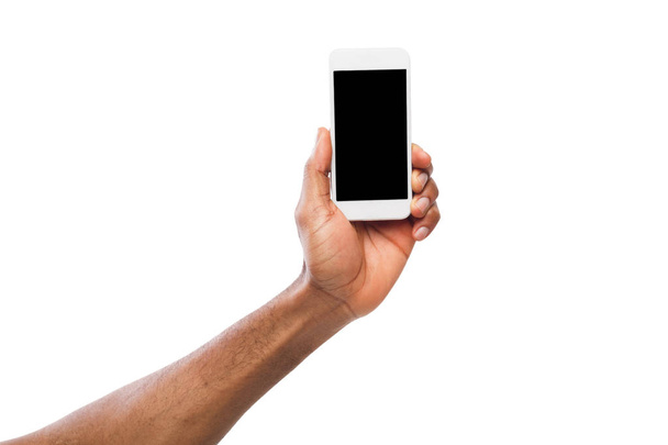 Hand holding mobile smartphone with blank screen - Valokuva, kuva