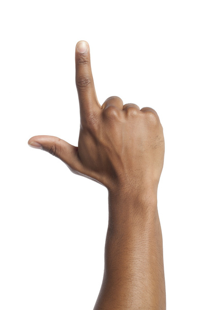 human hand gesturing a hand sign - Foto, afbeelding