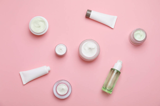 Flat lay composition with cosmetic products on color background - 写真・画像
