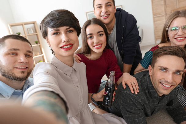Happy friends taking selfie indoors - Foto, afbeelding
