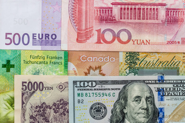 Yhdysvaltain US Kanadan dollari, euro, Japanin jeni ja Kiinan juan seteli
 - Valokuva, kuva