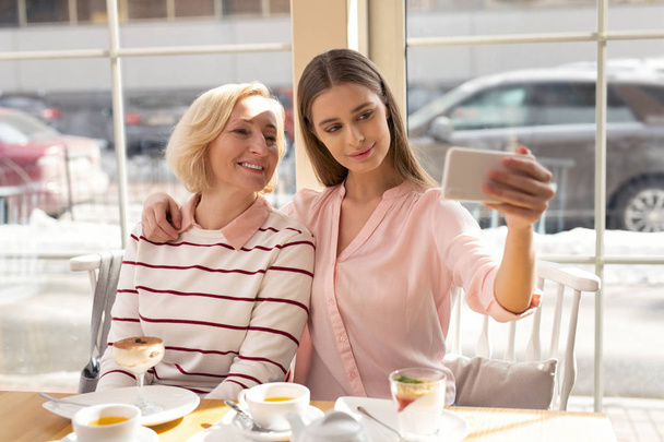 Happy granny and girl taking selfies - Photo, Image