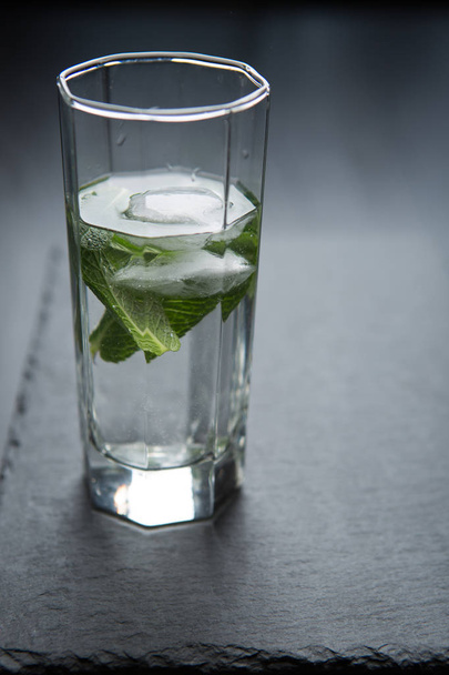 Glass of water with mint - 写真・画像