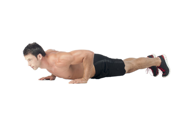 Hombre haciendo ejercicio push up - Foto, imagen