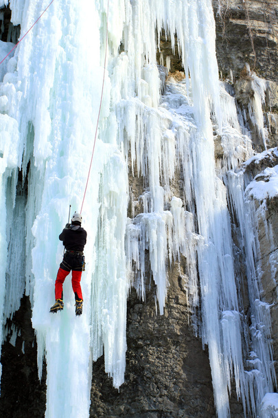 Ice climbing the waterfall. - Fotó, kép